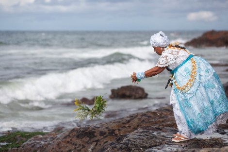 Salvador, Bahia, Brazil February 2nd is the feast of Yemnaja, a Candomble Umbanda religious celebration where thousands of adherants to these faith religions go to Rio Vermehlo Red River to make offerings of flowers and prayers, paying their respects to Yemanja, the Orixa goddess of the Sea and water
