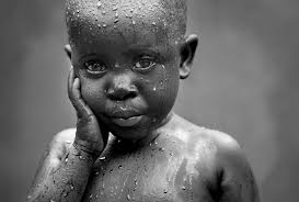 Lake Volta, Ghana: There are triumphs, too. Meet Kofi, a young boy who was rescued from slavery in a fishing village. I met Khofi at a shelter where Free the Slaves rehabilitate victims of slavery. He was bathing at the well, pouring big buckets of water over his head. Thanks to the efforts of organizations like Free the Slaves, today Kofi has been reunited with his parents, who were provided tools to make a living and to keep their children safe from human traffickers.