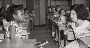 The Supreme Court’s decision in Brown v. Board of Education integrated the schools. But today its meaning is at issue. Here, the first day of desegregation, on Sept. 8, 1954, at Fort Myer Elementary School in Fort Myer, Va. 