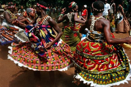 Dancers in Benin prepare for a ritual ceremony