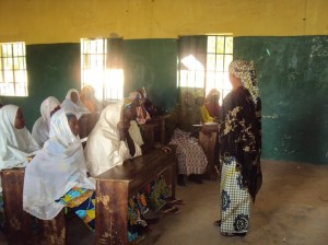 Girls and women in northern Nigerian attending a literacy class organized by the Isa Wali Empowerment Initiative