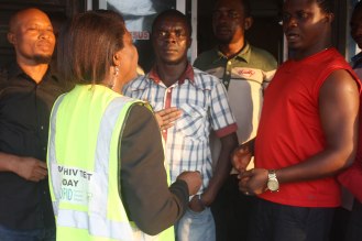Mama Condom talks about sexual health to a group of young Nigerians in Akwa Ibom State. November 28, 2013. Photo by Chika Oduah