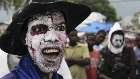 A vodou worshipper takes part in festivities on the first day of the Haitian Festival of Ancestors in Port-au-Prince. 