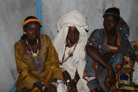 A fulani bride in Senegal dressed in white for her wedding