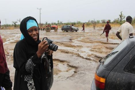 Me, Chika Oduah, on a rainy day on Chibok Road. 