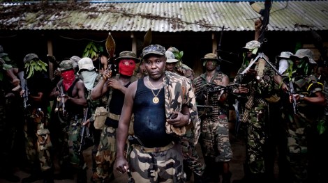 Ateke Tom, the big chief of the Mend, with his boys, in one of the eleven camps he ruled in the mangrove of the Niger delta. Feb 9 2009. (Photo by Veronique de Viguerie/ Getty Images)