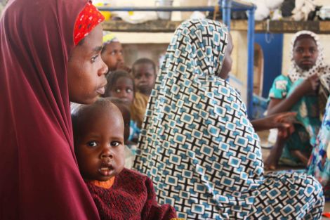 Bintu Tijjani lives at a camp in Maiduguri after Boko Haram shot her husband dead in Bama. Maiduguri, Nigeria. Photo by Chika Oduah. December 2014