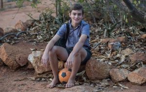 Kyle in his school uniform