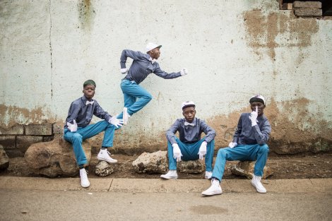 Members of the Rea Iketsetsa posing in their signature fashion in Soweto. Photo by: Chris Saunders