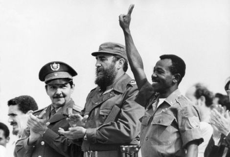 Then Ethiopian President Lieutenant Colonel Mengistu Haile Mariam (R) makes V sign alongside Fidel Castro